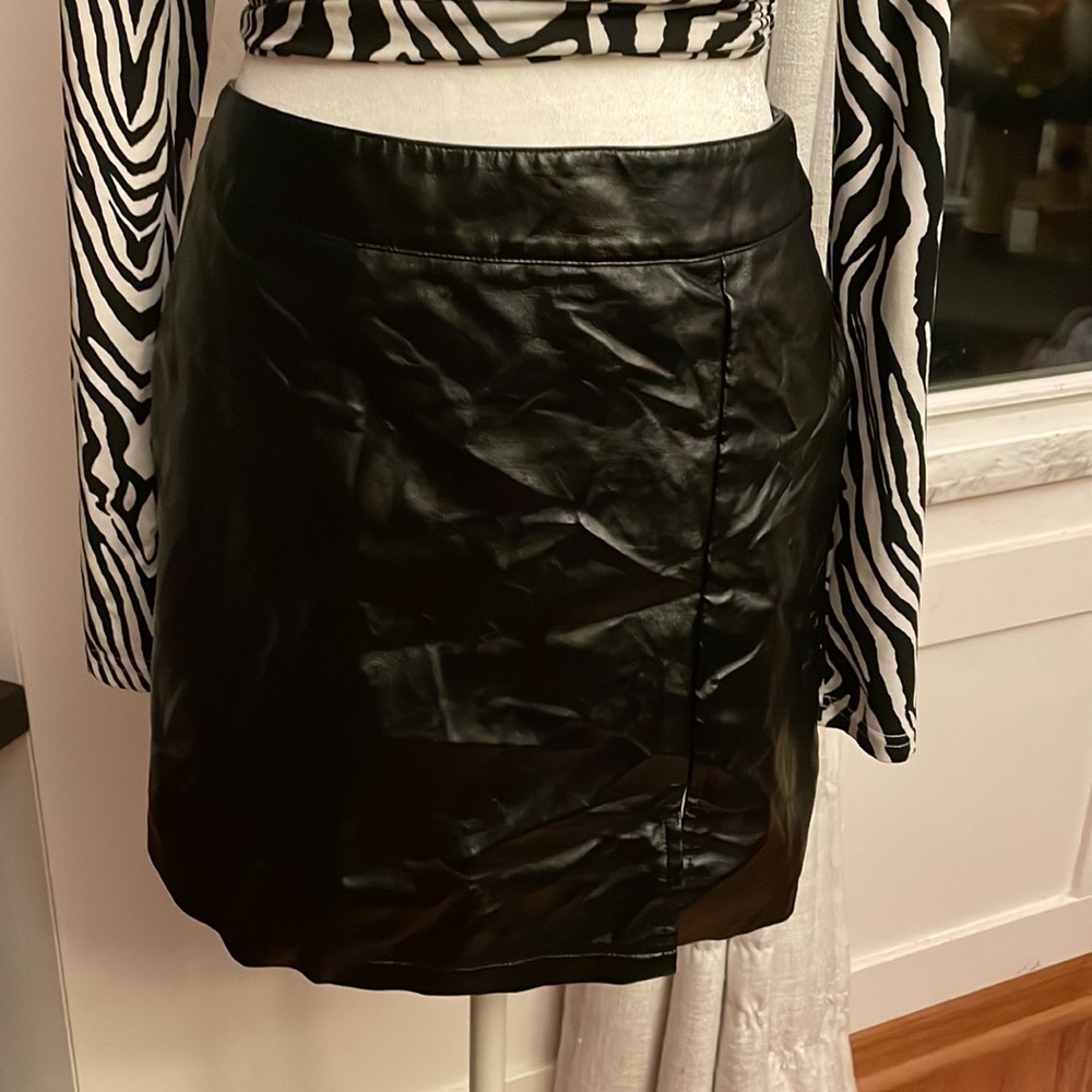 SHEIN black faux leather skirt.